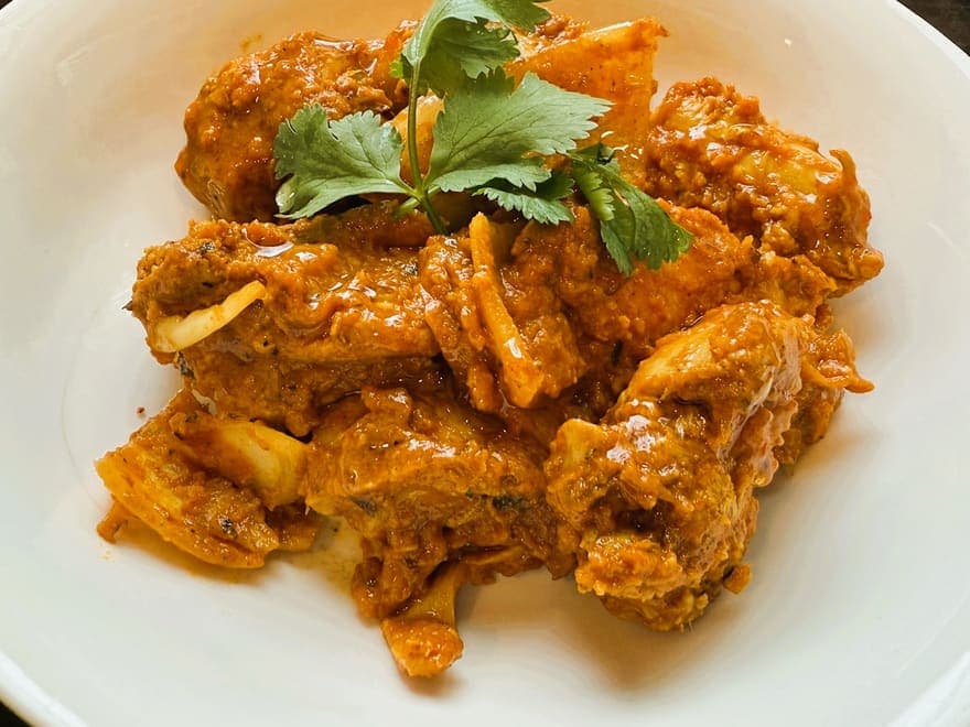 A North Indian chicken curry finished with fresh coriander.
